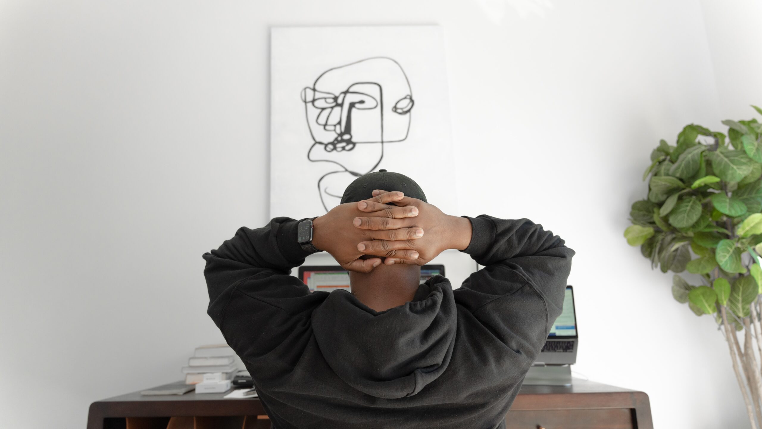 Man with hands on his head